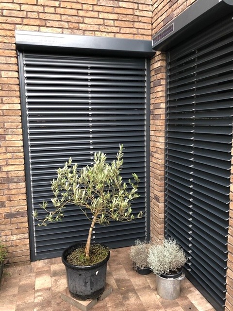 Rolluiken met kantelbare lamellen